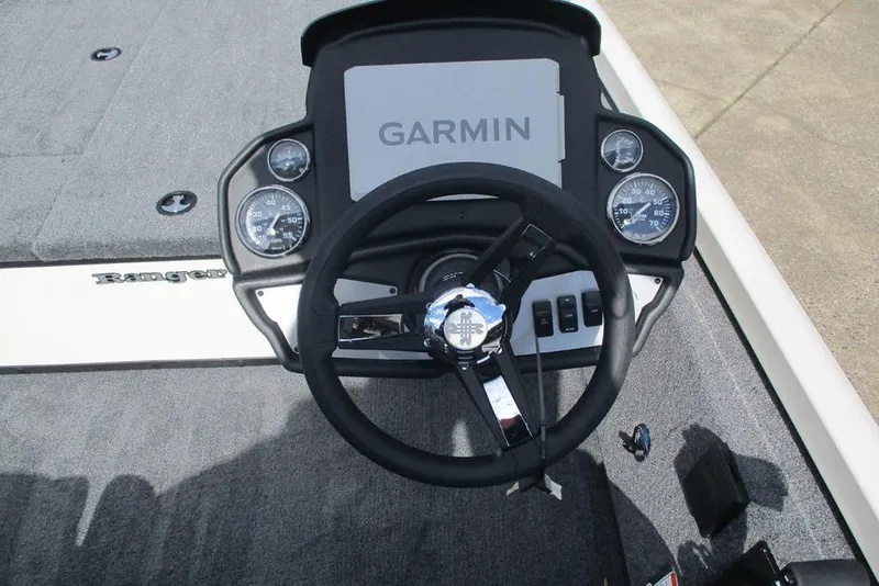 Slide: The Image of 2026 Ranger RT188 boat dashboard with Garmin display and steering wheel. - 5