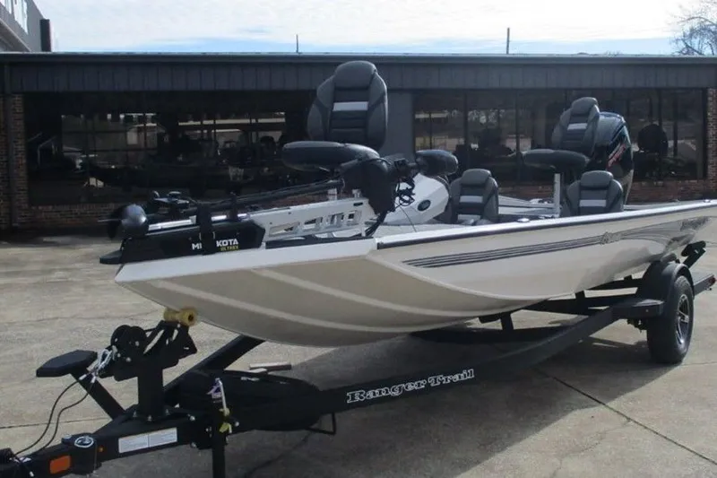 Slide: The Image of 2026 Ranger RT188 fishing boat on trailer, featuring sleek design and modern seating. - 7