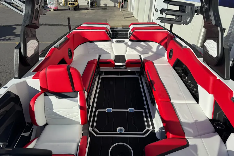 Slide: The Image of 2026 Supra SE 575 boat interior with red and white seating, modern design. - 10