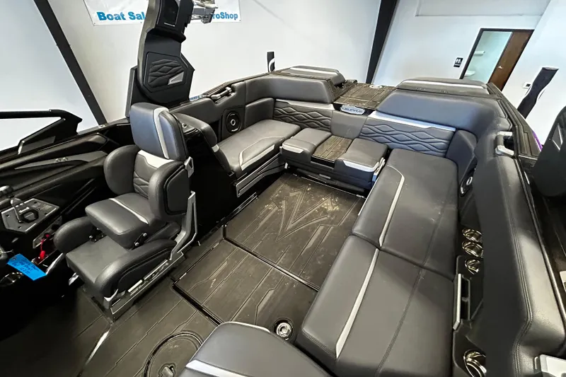 Slide: The Image of 2025 Supra SA boat interior with luxurious seating and modern design. - 7