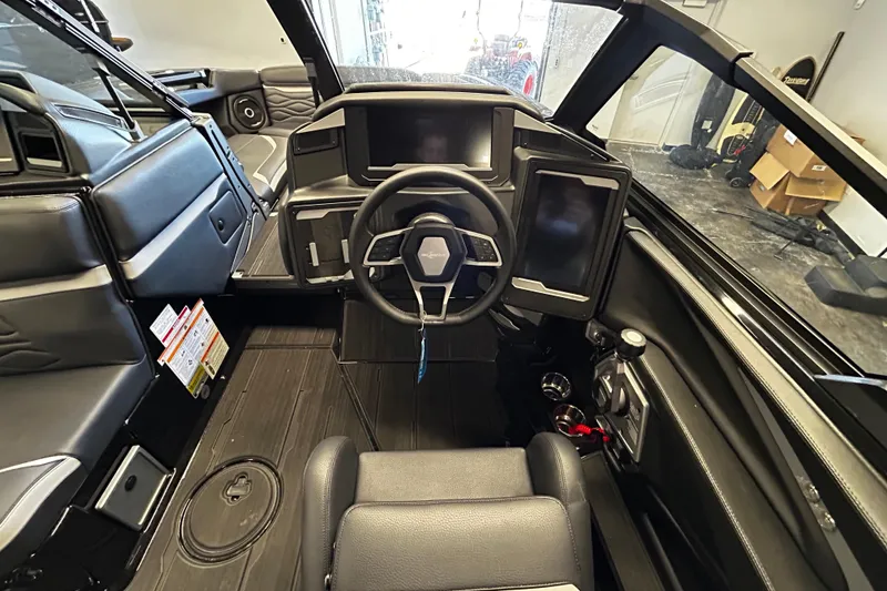Slide: The Image of 2025 Supra SA boat interior with modern dashboard and steering wheel design. - 8