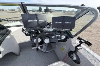Slide: The Image of 2009 Starcraft Starfire 1600 DC boat interior with dual Humminbird fish finders. - 3