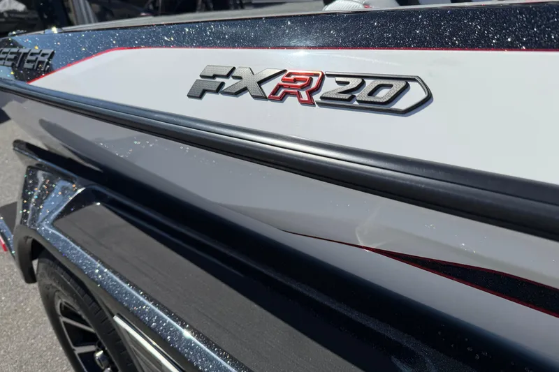 Slide: The Image of 2026 Skeeter FXR20 Apex boat with sleek design and metallic accents. - 10