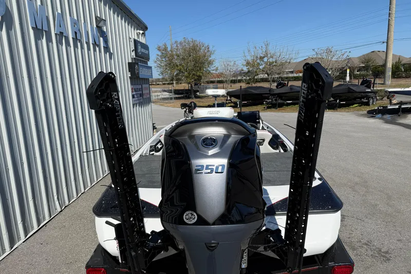 Slide: The Image of 2026 Skeeter FXR20 Apex boat with Yamaha 250 engine at marina. - 16