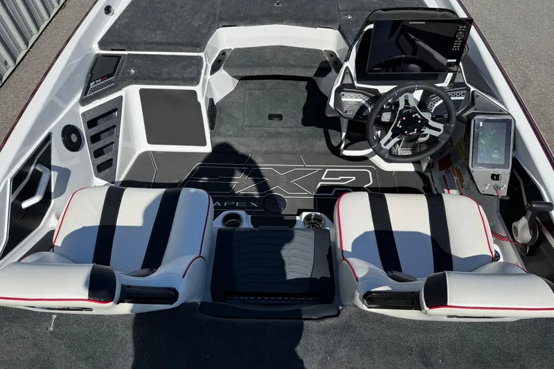 Slide: The Image of 2026 Skeeter FXR20 Apex boat interior with modern dashboard and seating. - 5