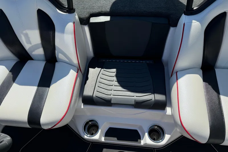 Slide: The Image of 2026 Skeeter FXR20 Apex boat interior with black and white seating, red accents. - 8