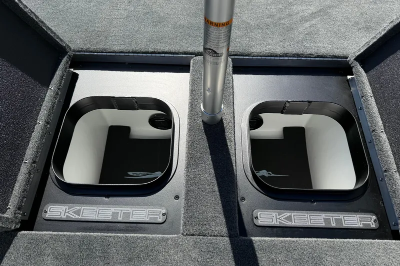 Slide: The Image of 2026 Skeeter FXR20 Apex boat storage compartments with sleek design and durable construction. - 9