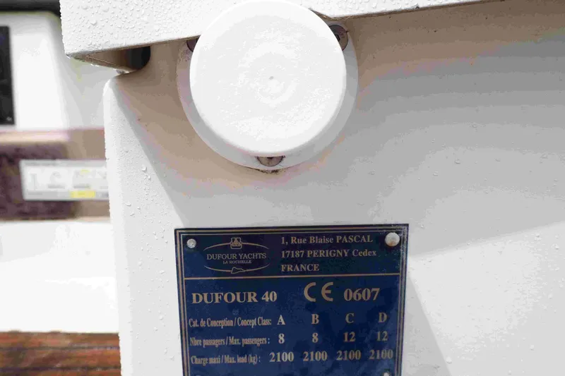 Slide: The Image of Plaque on 2004 Dufour 40 Performance yacht, displaying specifications and manufacturer details. - 35