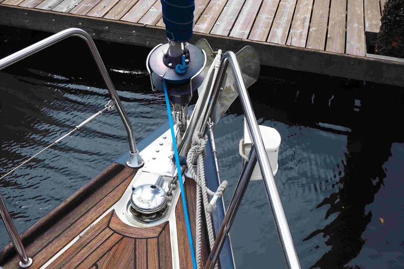 Slide: The Image of Bow of 2004 Dufour 40 Performance sailboat with anchor and ropes. - 36