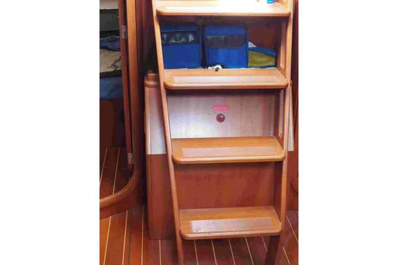 Slide: The Image of Wooden interior stairs on a 2004 Dufour 40 Performance sailboat. - 62