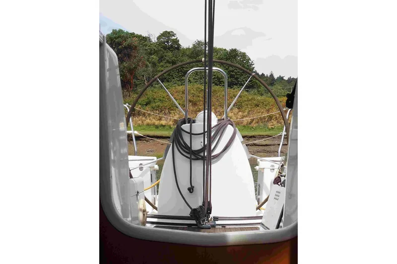 Slide: The Image of Cockpit view of 2004 Dufour 40 Performance sailboat with scenic background. - 63