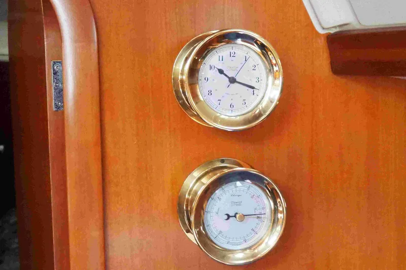 Slide: The Image of Brass clock and barometer on Dufour 40 Performance yacht, 2004 model. - 66