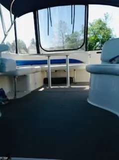 Slide: The Image of Interior of a 2006 Bayliner 325 yacht with seating area. - 5