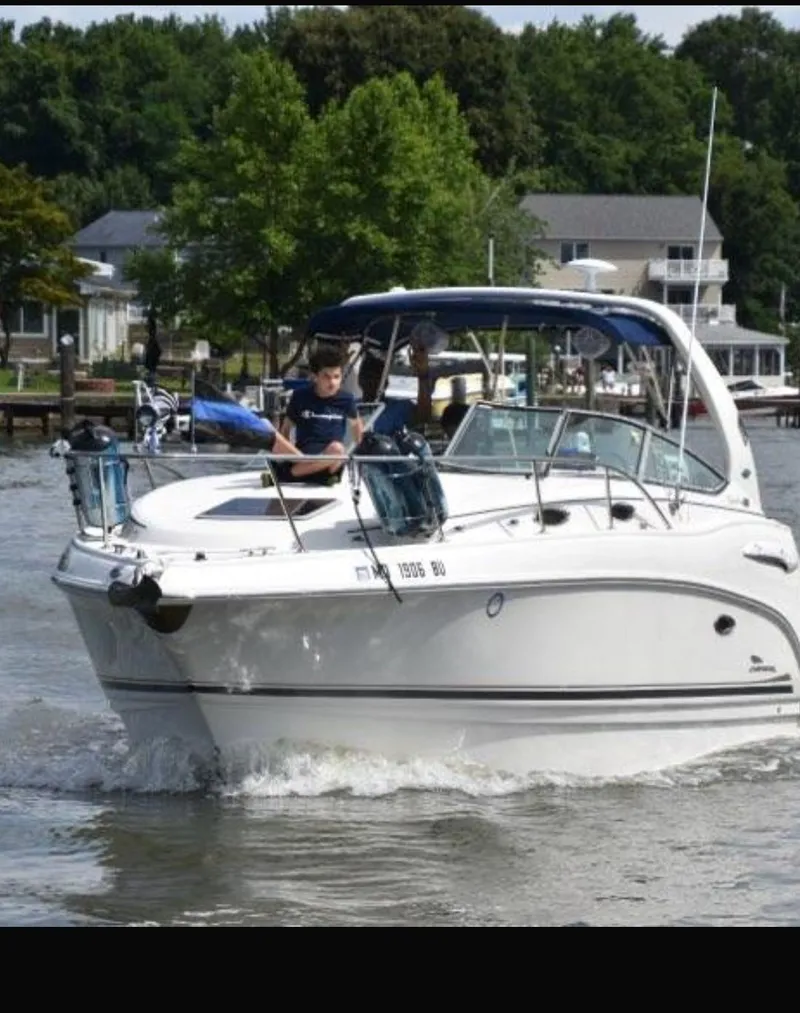 The Image of 2004 Chaparral Signature 270 boat on a river. - 0