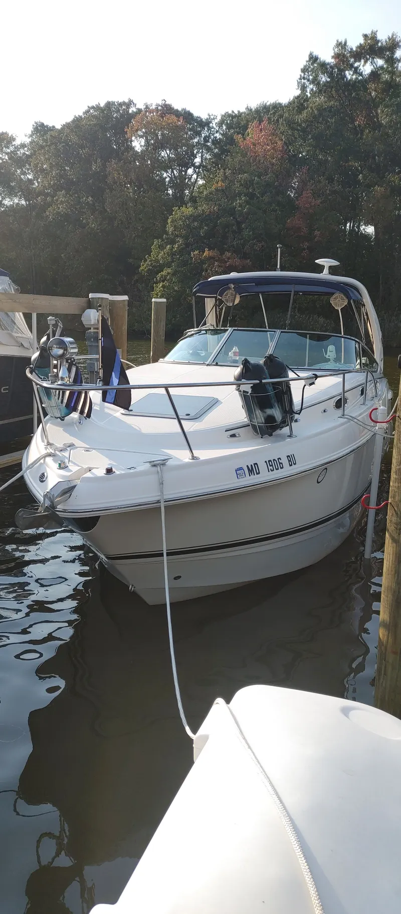 Slide: The Image of 2004 Chaparral Signature 270 boat docked in harbor. - 2