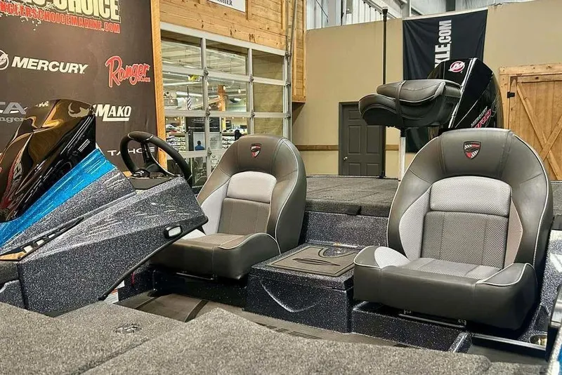 Slide: The Image of 2026 Triton 20XP Patriot boat interior with dual seats and modern dashboard. - 12