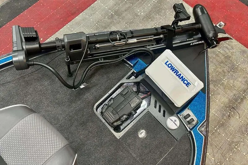 Slide: The Image of Triton 20XP Patriot 2026 boat deck with Lowrance equipment and trolling motor. - 13