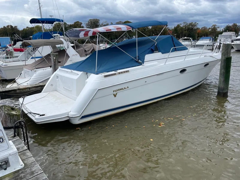 The Image of 2000 Formula 34 Performance Cruiser docked at marina. - 0