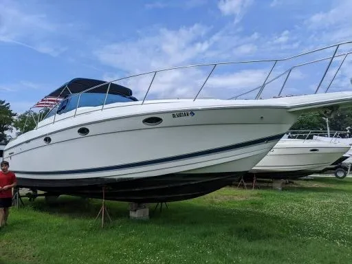 Slide: The Image of 2000 Formula 34 Performance Cruiser parked on grass. - 3