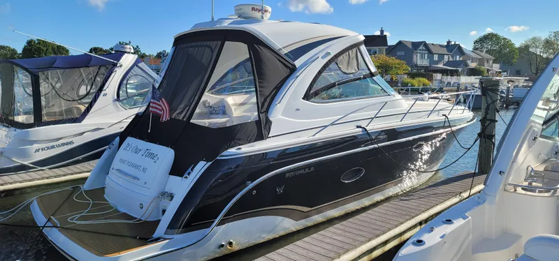 The Image of 2012 Formula 37 Performance Cruiser docked, sleek design. - 0