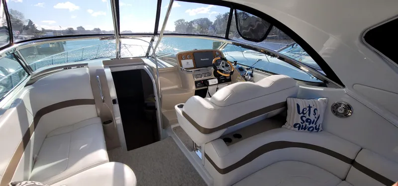 Slide: The Image of Interior of a 2012 Formula 37 Performance Cruiser with luxurious seating area. - 17