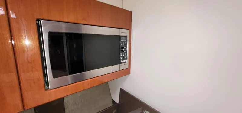 Slide: The Image of Microwave in the galley of a 2012 Formula 37 Performance Cruiser. - 24