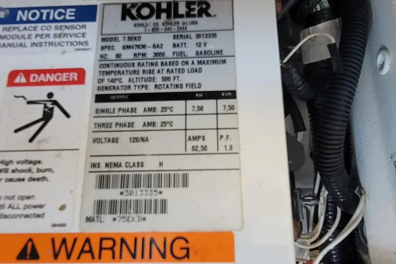 Slide: The Image of Kohler generator label on Formula 37 Performance Cruiser, year 2012. - 49