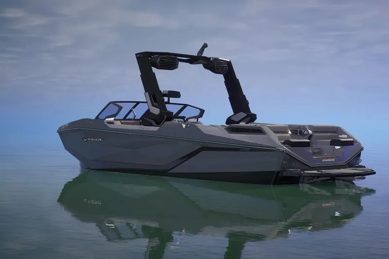 Slide: The Image of 2026 Nautique Super Air Nautique G25 Paragon on calm water, showcasing sleek design. - 4