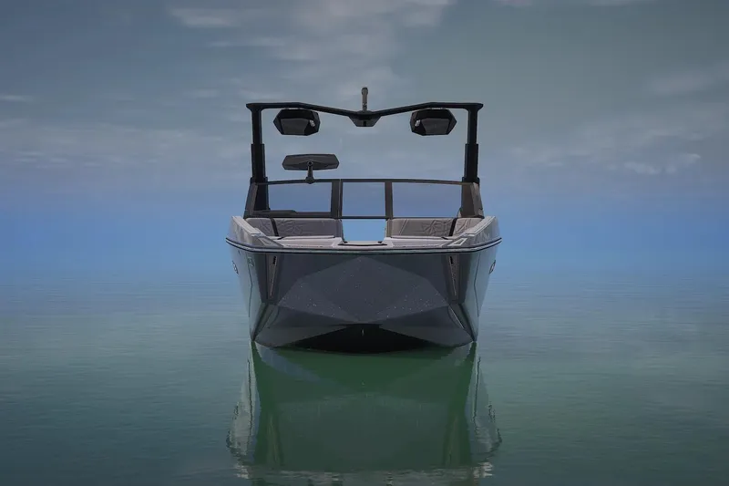 Slide: The Image of 2026 Nautique Super Air Nautique G25 Paragon on calm water, front view. - 5