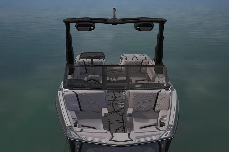 Slide: The Image of 2026 Nautique Super Air Nautique G25 Paragon boat interior on calm water. - 9