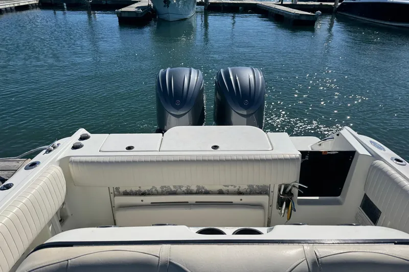 Slide: The Image of 2001 Hydra-Sports Vector 2390 CC boat with dual engines at a marina. - 5