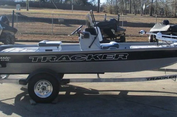 Slide: The Image of 2026 Tracker Bass Tracker Classic CC boat on trailer, parked outdoors. - 4