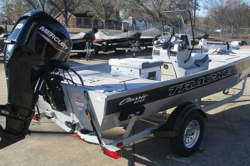 Slide: The Image of 2026 Tracker Bass Tracker Classic CC boat with Mercury engine on trailer. - 6