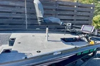 Slide: The Image of 2025 Tracker Pro Team 175 TXW fishing boat with seating and navigation equipment. - 14