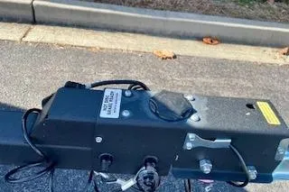 Slide: The Image of Trailer hitch of 2025 Tracker Pro Team 175 TXW on pavement background. - 16