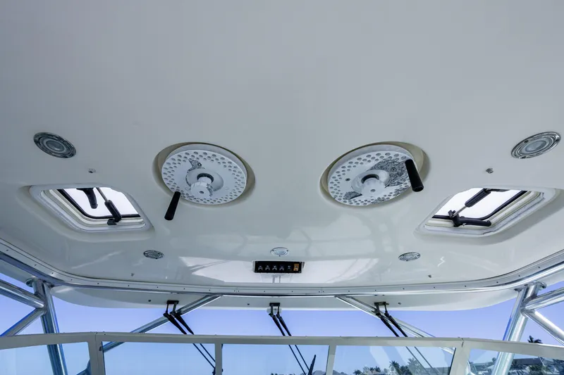 Slide: The Image of 2010 Scout 350 Abaco boat interior ceiling with hatches and lights. - 42