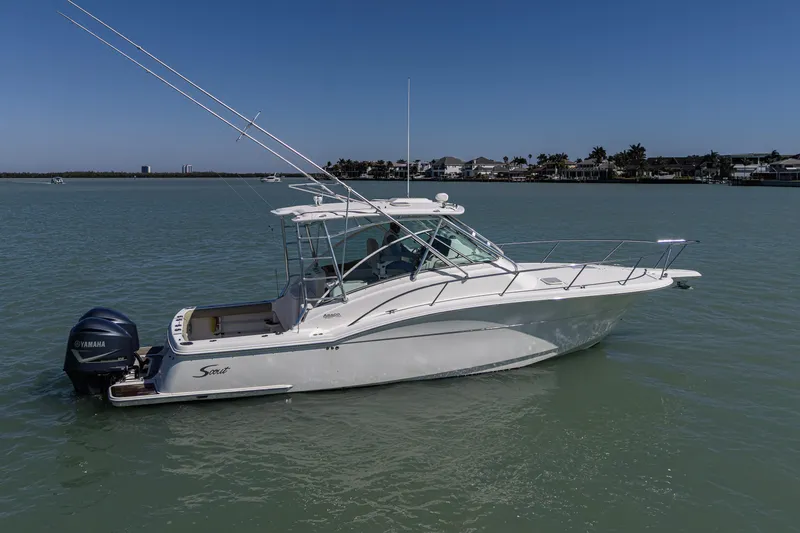 Slide: The Image of 2010 Scout 350 Abaco boat on calm water with Yamaha engine. - 5