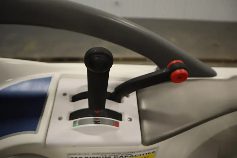 Slide: The Image of 2001 Sea-Doo Challenger 1800 throttle control lever, close-up view. - 18