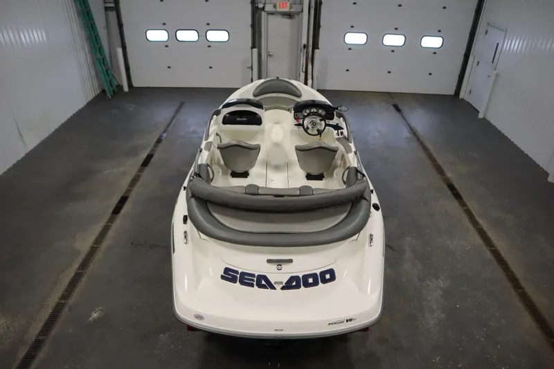 Slide: The Image of 2001 Sea-Doo Challenger 1800 boat in a garage, viewed from above. - 9