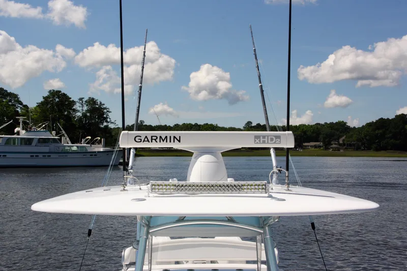 Slide: The Image of 2019 Bahama 41 boat with Garmin xHD2 radar on calm water. - 26