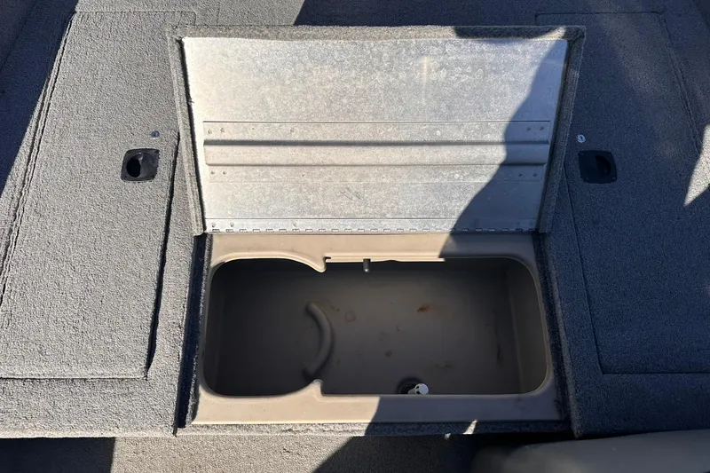 Slide: The Image of Open storage compartment on 2011 Tracker Pro Team 175 TF boat. - 13