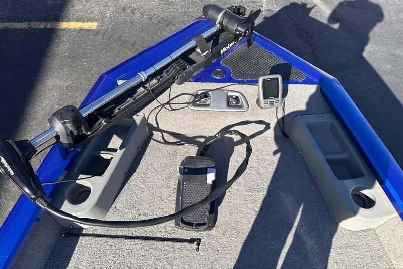 Slide: The Image of 2011 Tracker Pro Team 175 TF boat deck with trolling motor and fish finder. - 14