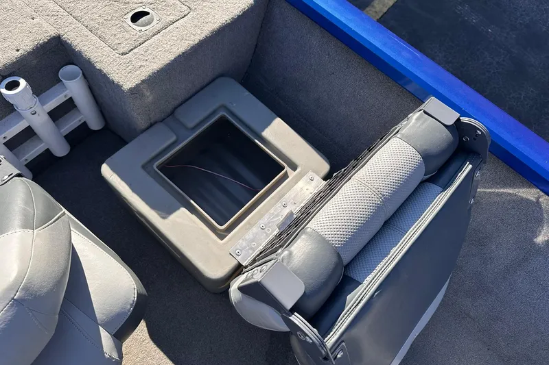 Slide: The Image of 2011 Tracker Pro Team 175 TF boat interior with seating and storage compartment. - 20