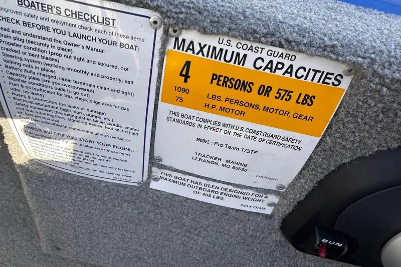 Slide: The Image of 2011 Tracker Pro Team 175 TF capacity label, U.S. Coast Guard compliance, 4 persons or 575 lbs. - 25