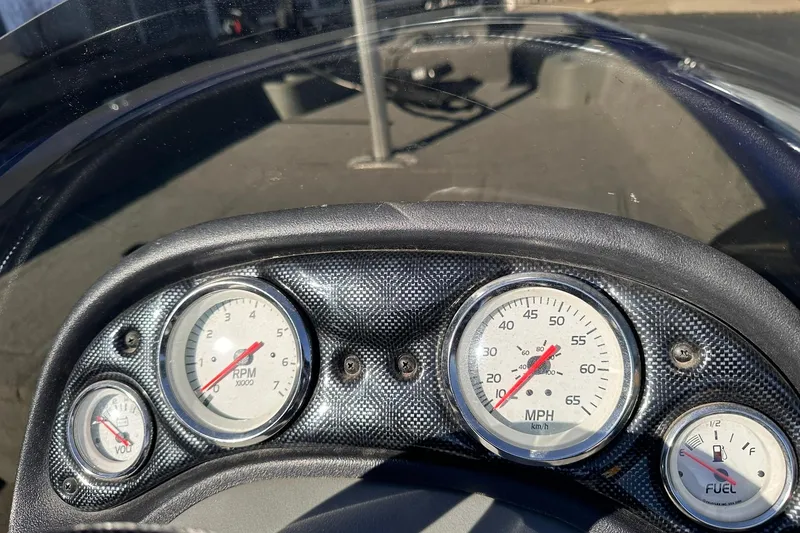 Slide: The Image of Dashboard of 2011 Tracker Pro Team 175 TF boat with speedometer and gauges. - 9