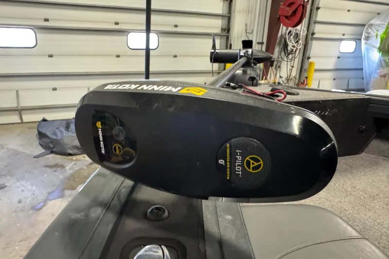Slide: The Image of 2022 Tracker Targa V-18 WT with Minn Kota i-Pilot trolling motor in garage. - 15