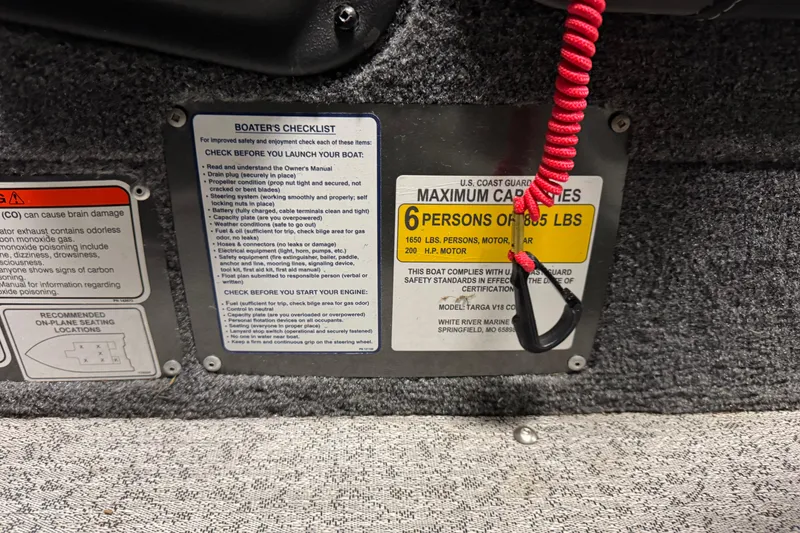 Slide: The Image of Boat safety checklist and capacity label for 2022 Tracker Targa V-18 WT. - 19