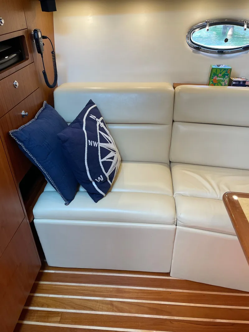 Slide: The Image of Dashboard of 2004 Tiara Yachts 42 Open with Garmin displays. - 15