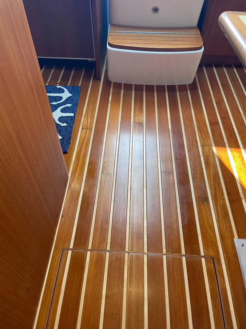 Slide: The Image of Control panel of 2004 Tiara Yachts 42 Open with switches. - 17