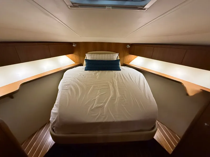 Slide: The Image of Interior of 2004 Tiara Yachts 42 Open with cozy bed. - 31